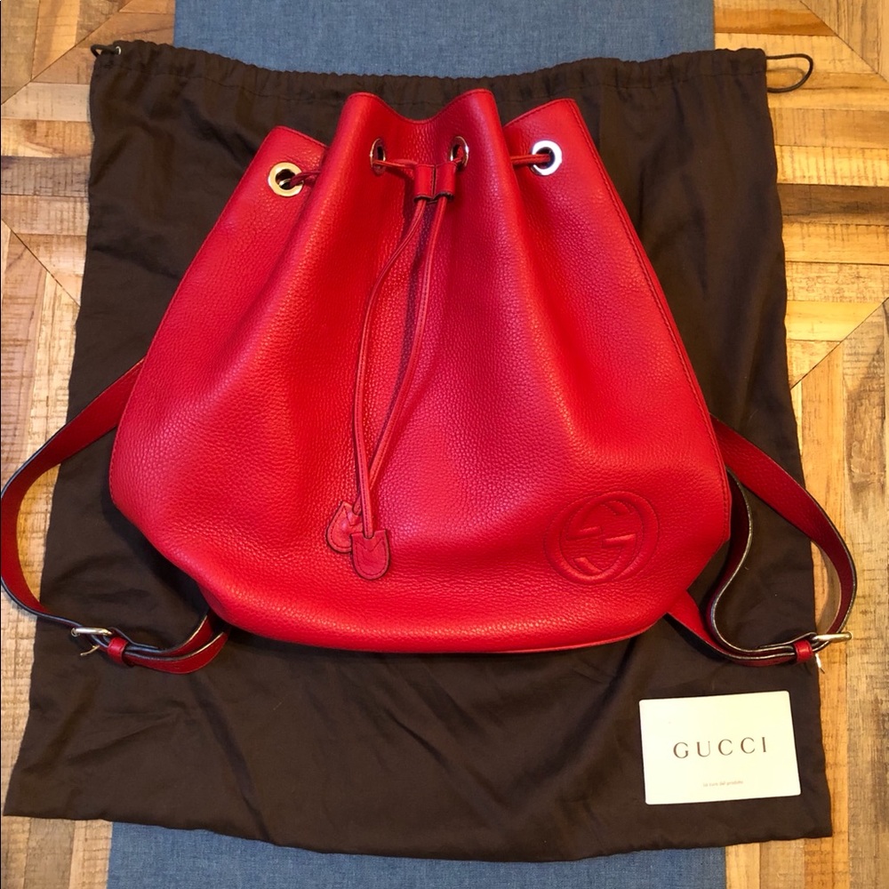 GUCCI
Pebbled Leather Soho Drawstring Backpack Red